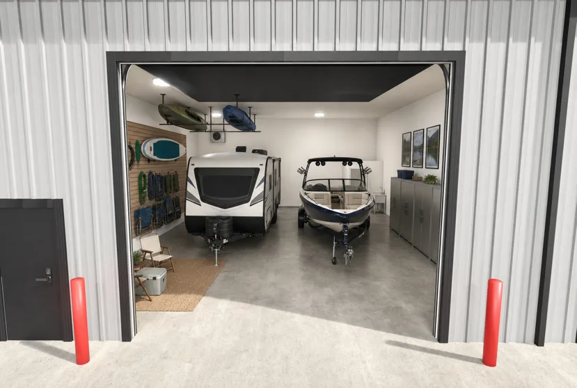 Rendering of a travel trailer and a boat on its trailer parked side by side inside a garage condo.